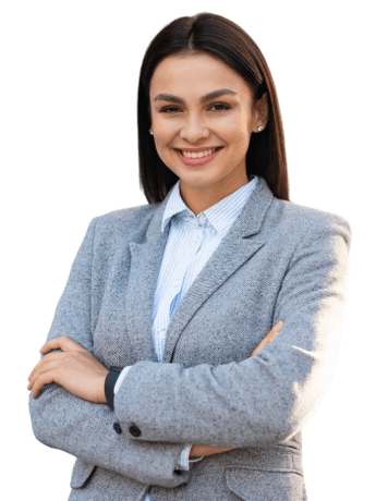 smiley businesswoman posing outdoors with arms crossed